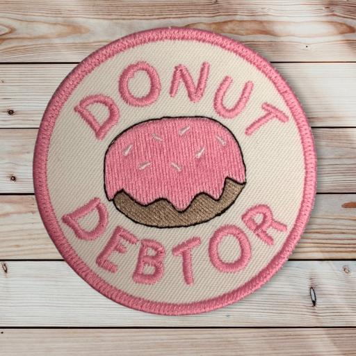 Donut Debtor 8cm Round Patch.